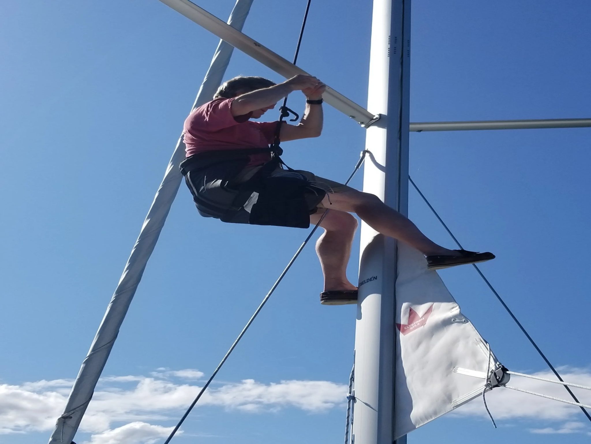Kevin climbing the mast