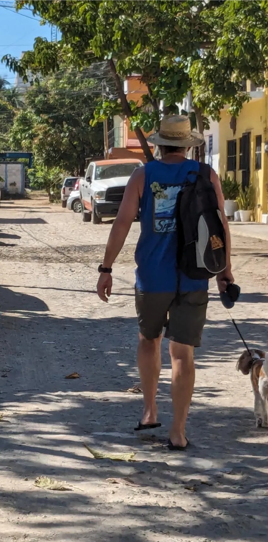 Kevin & Riley walked down a street in La Cruz