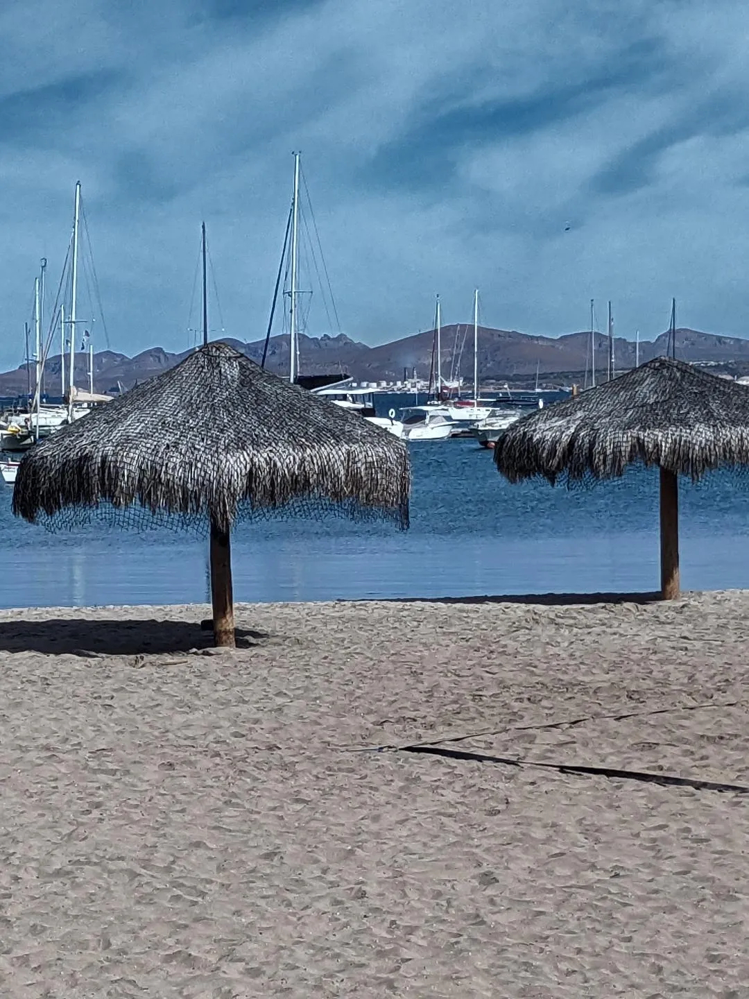 Palapas on the beach in downtown La Paz