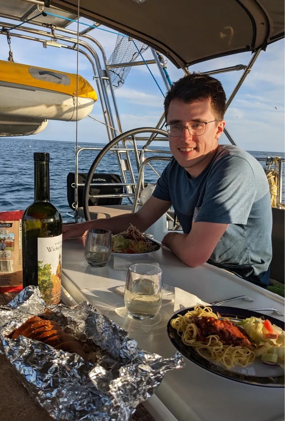 Waterfront dining - Ryan having dinner on Island Summers