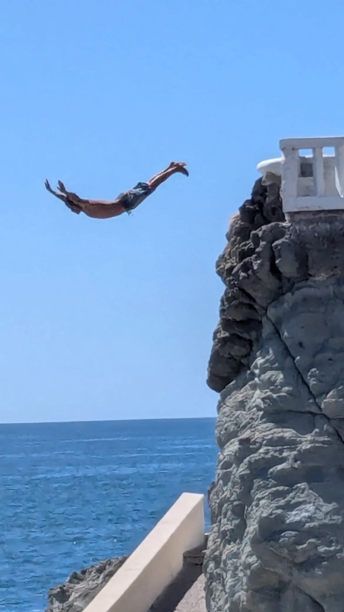 Cliff diver at Punta de Clavadistas, Mazatlan, Mexico (note: tide was low)